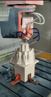 7.5KWヘビーデューティスピンドルと3000×1300mm加工テーブルを備えた5軸石材CNC彫刻機、全方向3D彫刻用